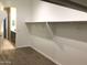 Large walk-in closet with ample shelving and hanging space at 1255 N Arizona Ave # 1099, Chandler, AZ 85225