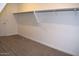 Spacious walk-in closet featuring built-in shelves and hanging rods at 1255 N Arizona Ave # 1099, Chandler, AZ 85225