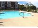 Inviting community pool with ample deck space and lounge chairs at 1255 N Arizona Ave # 1099, Chandler, AZ 85225