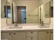 Bathroom with double vanity and modern fixtures at 1187 E Tonto Dr, Chandler, AZ 85249