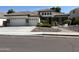 Single-story home with a three-car garage and landscaped front yard at 1187 E Tonto Dr, Chandler, AZ 85249