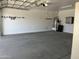 Spacious garage with storage and water softener at 1187 E Tonto Dr, Chandler, AZ 85249