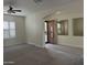 Living room with hardwood floors, neutral walls, and a view of the entryway at 1187 E Tonto Dr, Chandler, AZ 85249