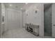 Bright bathroom featuring marble flooring, a glass-enclosed shower, and stylish lighting fixtures at 12651 S 71St St, Tempe, AZ 85287