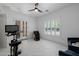 Bright, light room with french doors to exterior and large window with plantation shutters is well-lit and roomy at 12651 S 71St St, Tempe, AZ 85287