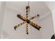 Contemporary chandelier with geometric metal and bulb design at 12651 S 71St St, Tempe, AZ 85287