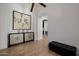 Entryway with tiled floors, mosaic buffet cabinet, and ornate artwork at 12651 S 71St St, Tempe, AZ 85287