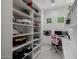 Bright office with built-in shelves, desk, and workstation at 12651 S 71St St, Tempe, AZ 85287