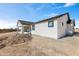 New construction home showcasing side elevation at 22750 E Roper Ln, Florence, AZ 85132