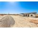 Desert home featuring simple lines and large windows at 22750 E Roper Ln, Florence, AZ 85132