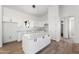 Modern kitchen featuring white cabinets and quartz countertops at 22750 E Roper Ln, Florence, AZ 85132