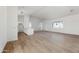 Bright and airy living room with an open kitchen and island at 22750 E Roper Ln, Florence, AZ 85132