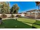 Backyard with putting green and gazebo at 25809 S Hollygreen Dr, Sun Lakes, AZ 85248