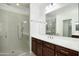 Bathroom featuring a glass shower, vanity, and great lighting at 19591 W Lincoln St, Buckeye, AZ 85326