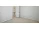 Bright bedroom with a walk-in closet, clean carpet and ample natural light at 19591 W Lincoln St, Buckeye, AZ 85326