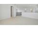 Bright, carpeted bonus room with a decorative railing and open doorway at 19591 W Lincoln St, Buckeye, AZ 85326
