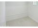 An empty room with neutral paint, carpet and trim ready for its new owner at 19591 W Lincoln St, Buckeye, AZ 85326