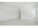 Spacious, bright living room with tile flooring, offering a clean and modern aesthetic at 19591 W Lincoln St, Buckeye, AZ 85326