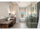 Bright bathroom with a soaking tub, walk-in shower, and modern fixtures at 3518 N Shadow Trl, Mesa, AZ 85207
