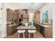 Spacious kitchen featuring designer cabinets, stainless appliances, and a functional center island at 3518 N Shadow Trl, Mesa, AZ 85207
