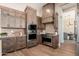 Well-equipped kitchen showcasing stainless appliances, custom cabinetry, and an open layout at 3518 N Shadow Trl, Mesa, AZ 85207