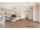 Open-concept living room features a fireplace, plush seating, and access to outdoor space at 3518 N Shadow Trl, Mesa, AZ 85207