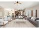 Spacious living room seamlessly connects to a gourmet kitchen at 3518 N Shadow Trl, Mesa, AZ 85207