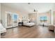 Expansive main bedroom offers natural light and access to a private balcony at 3518 N Shadow Trl, Mesa, AZ 85207