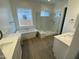 Bathroom with soaking tub, shower, and double vanity at 1184 E Gleneagle Dr, Chandler, AZ 85249