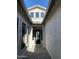 Light-filled entryway with high ceilings and a black front door at 1184 E Gleneagle Dr, Chandler, AZ 85249