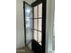 Modern black front door with glass panels and sidelight at 1184 E Gleneagle Dr, Chandler, AZ 85249