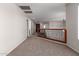 Upstairs hallway with carpeted floors and decorative railing at 15115 W Cottonwood St, Surprise, AZ 85374