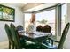 Sunlit dining area with bay window and seating for six at 8976 W Stella Ave, Glendale, AZ 85305