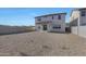 The backyard features a covered patio, stucco exterior and low-maintenance gravel at 4106 W Eli Dr, San Tan Valley, AZ 85144