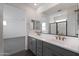 New bathroom with double sinks, modern hardware, and a tiled shower at 4106 W Eli Dr, San Tan Valley, AZ 85144