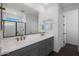 New bathroom with double sinks, modern hardware, and a tiled shower at 4106 W Eli Dr, San Tan Valley, AZ 85144