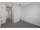 Large bedroom with neutral carpet and multiple access doors at 4106 W Eli Dr, San Tan Valley, AZ 85144