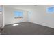 New carpeted bedroom with large windows and a view at 4106 W Eli Dr, San Tan Valley, AZ 85144