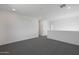 Spacious bonus room with gray carpet and white walls at 4106 W Eli Dr, San Tan Valley, AZ 85144