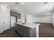 New kitchen with white countertops, gray cabinets, stainless appliances, and a kitchen island at 4106 W Eli Dr, San Tan Valley, AZ 85144