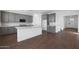 New kitchen with white countertops, gray cabinets, stainless appliances, and a kitchen island at 4106 W Eli Dr, San Tan Valley, AZ 85144