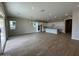 Large open concept living area and kitchen with recessed lighting and lots of natural light at 10015 W Verde Ln, Avondale, AZ 85392