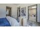 Bright bedroom with ensuite bathroom access and stylish furnishings at 4946 N Ascent Dr, Scottsdale, AZ 85251