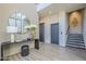 Elegant entryway with a large mirror, modern console table, and elevator access at 4946 N Ascent Dr, Scottsdale, AZ 85251