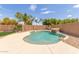 Relaxing kidney shaped pool with rock waterfall feature at 11543 E Quade Ave, Mesa, AZ 85212