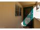 Condo entry with green door and security gate at 11333 N 92Nd St # 2028, Scottsdale, AZ 85260