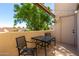 Private patio with table and chairs, perfect for relaxing at 11333 N 92Nd St # 2028, Scottsdale, AZ 85260