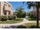 Well-maintained walkway leading to tennis court at 11333 N 92Nd St # 2028, Scottsdale, AZ 85260