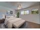 Relaxing Primary bedroom with neutral decor and ample natural light at 2104 N Olive Ave, Mesa, AZ 85203