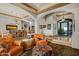 Spacious living area showcasing travertine floors and seamless transition to dining room at 10911 E Taos Dr, Scottsdale, AZ 85262